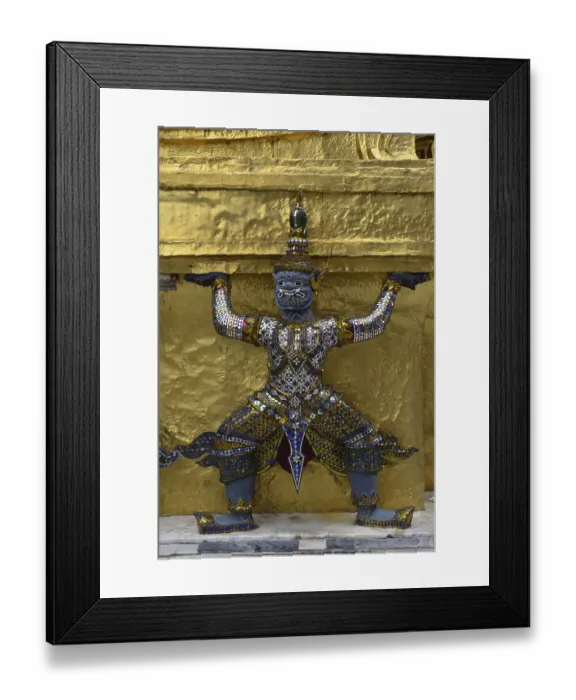 Framed Print : Guardian figure on a golden chedi
