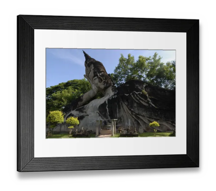 Framed Print : Giant reclining Buddha statue in Buddha Park Framed Print : Giant reclining Buddha statue in Buddha Park