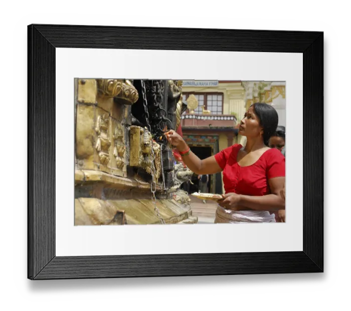 Framed Print : Believing woman in the Swayambhunath temple