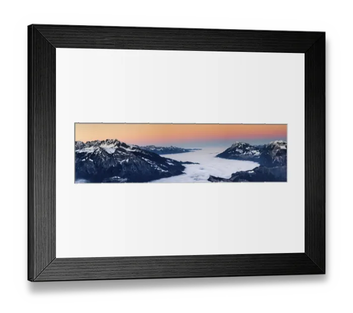 Framed Print : Winter mountain landscape at sunset with cloud cover in the valley below in the Rhine Valley in Switzerland