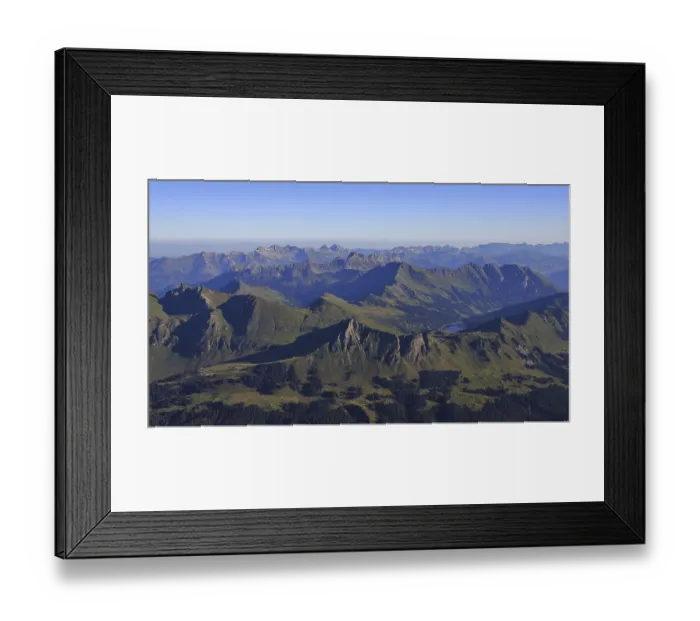 Framed Print : Mountain ranges in the Swiss Alps on a summer morning