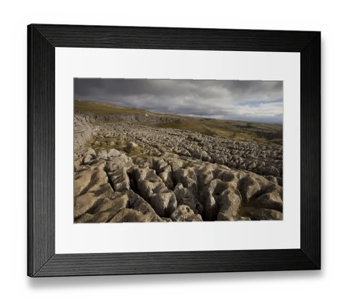 Framed Print : View of limestone pavement in upland landscape