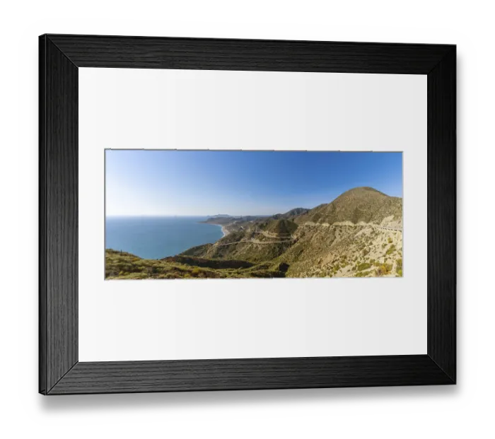 Framed Print : Panorama view of a scenic winding mountain road on the Costa de Almeria in southern Spain