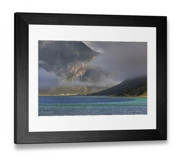 Framed Print : Fog moving over a fjord near Flakstad