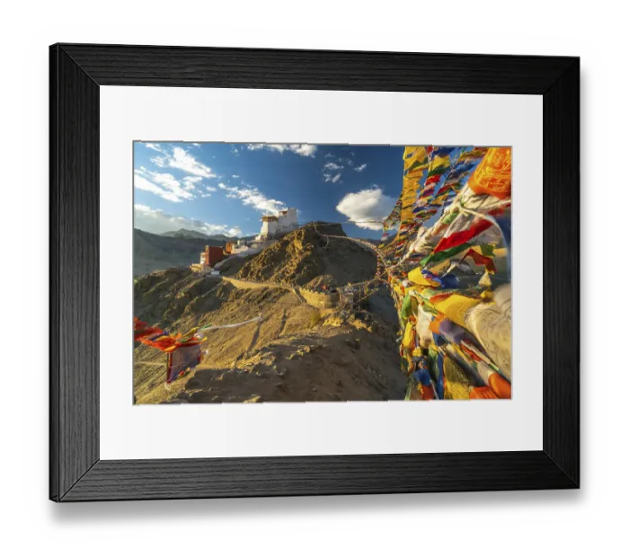 Framed Print : Buddhist Prayer flags connecting two peaks of Peak of Victory above Leh