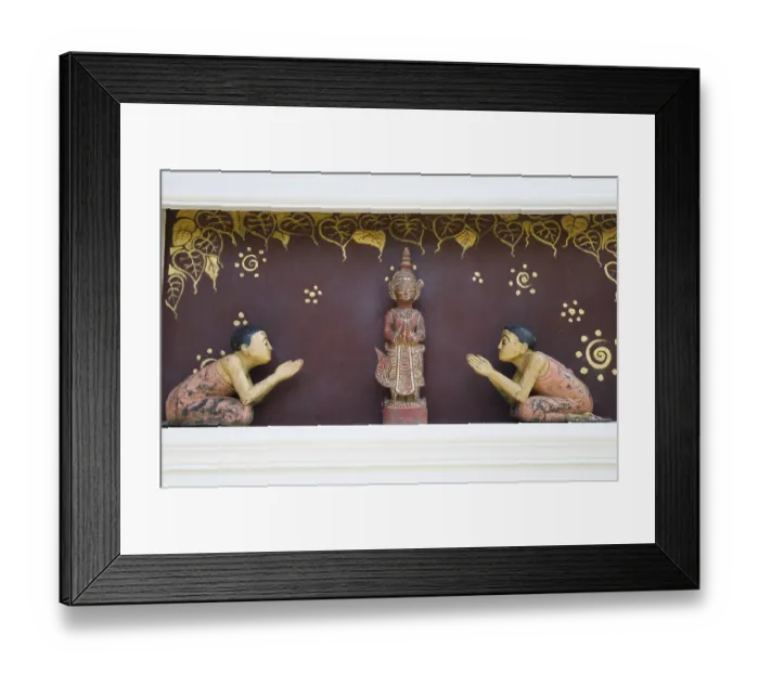 Framed Print : Wood cariving, Thai figures pray to Buddha figure