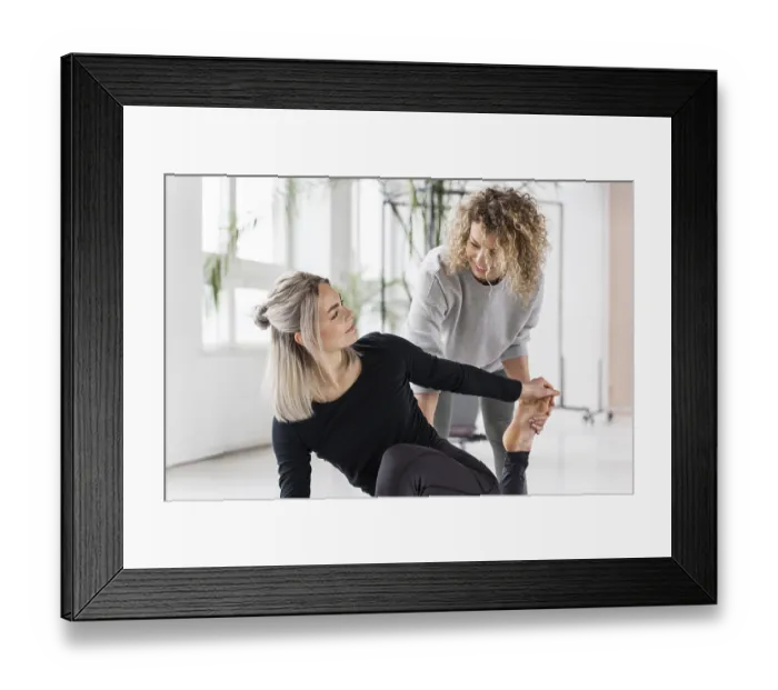 Framed Print : Woman doing yoga with teacher
