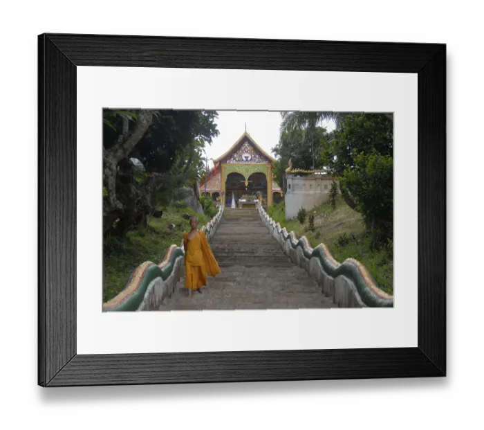 Framed Print : Buddhist monk on the long steps leading to the Wat Jom Khao Manilat temple in Houay Xai Framed Print : Buddhist monk on the long steps leading to the Wat Jom Khao Manilat temple in Houay Xai
