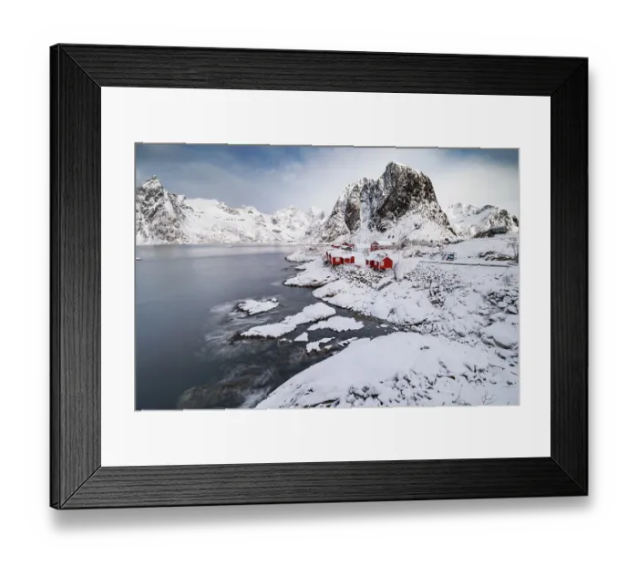 Framed Print : Rorbuer fishermen's cabins on the snowy fjord