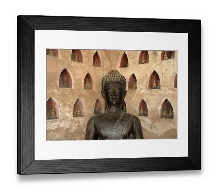 Framed Print : Bronze Buddha statue in a corner Framed Print : Bronze Buddha statue in a corner