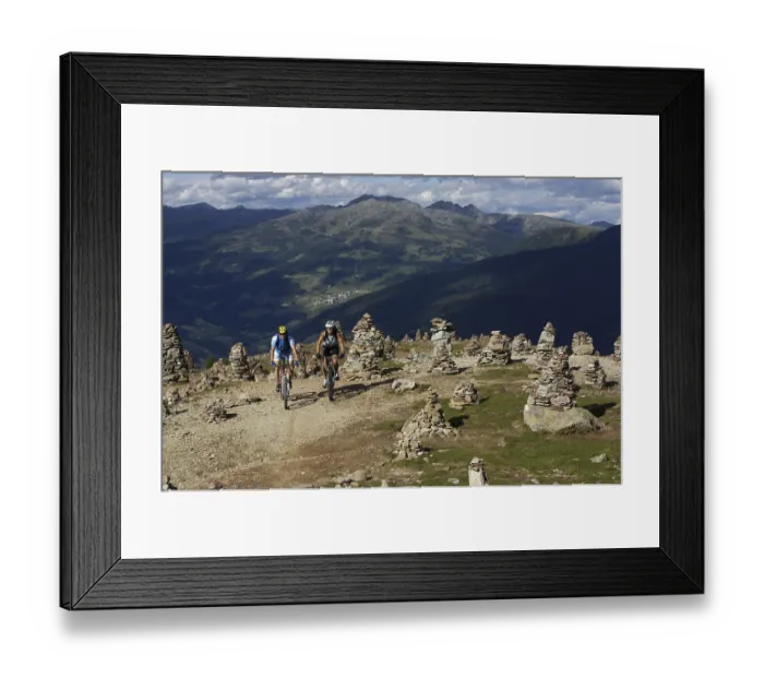 Framed Print : Female and male mountain bikers at Stoanernen Mandlen