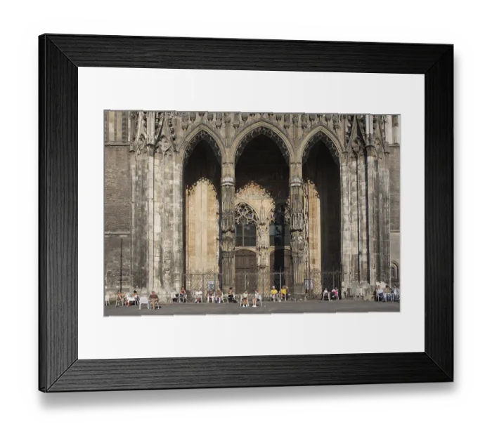 Framed Print : Entrance to Ulm Cathedral with people standing in front on Muensterplatz Framed Print : Entrance to Ulm Cathedral with people standing in front on Muensterplatz