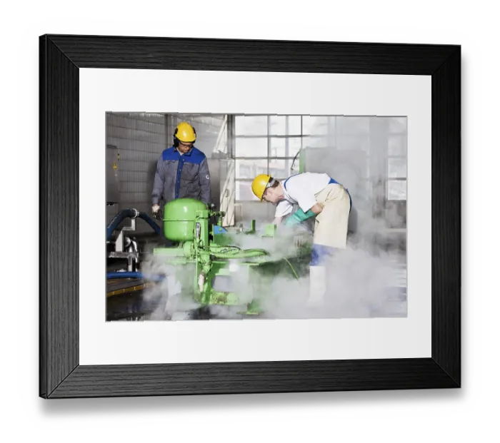 Framed Print : On-site service at GE Energy