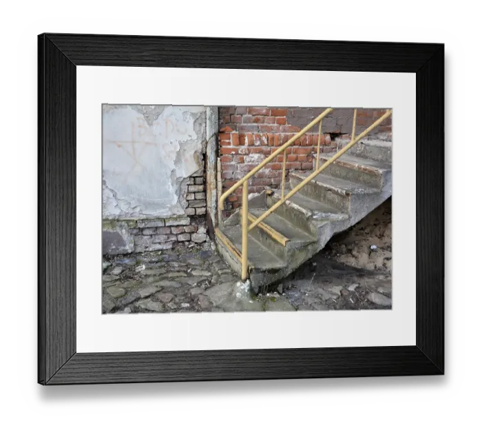 Framed Print : Stairs at an abandoned railway station building