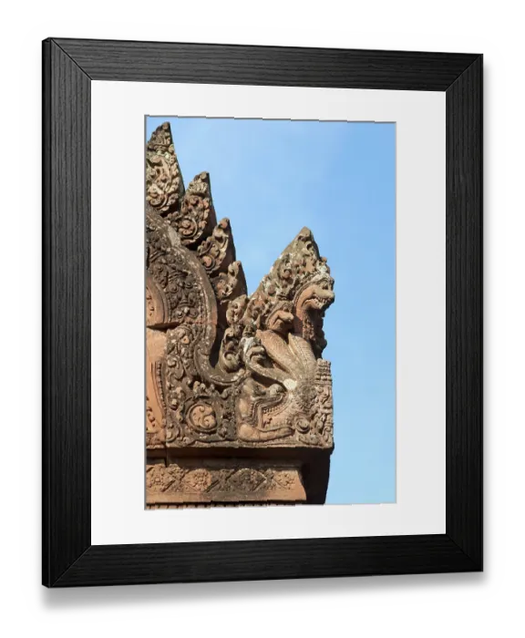 Framed Print : Naga sculpture as part of the roof decoration