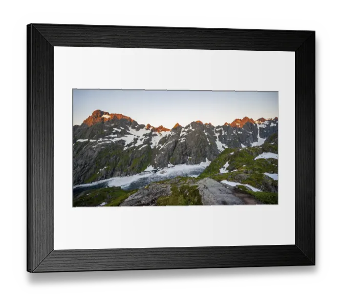 Framed Print : Rocky mountain peaks and Trollfjordvatnet with snow