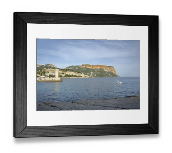 Framed Print : Shore with bay, boat, lighthouse and rock Soubeyran