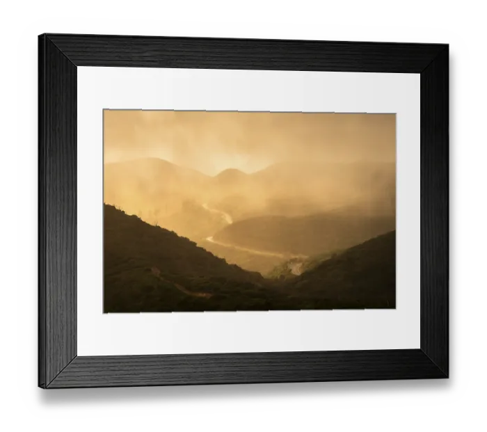 Framed Print : View from a path below the summit of Garajonay to other mountains of the Garajonay National Park and a road