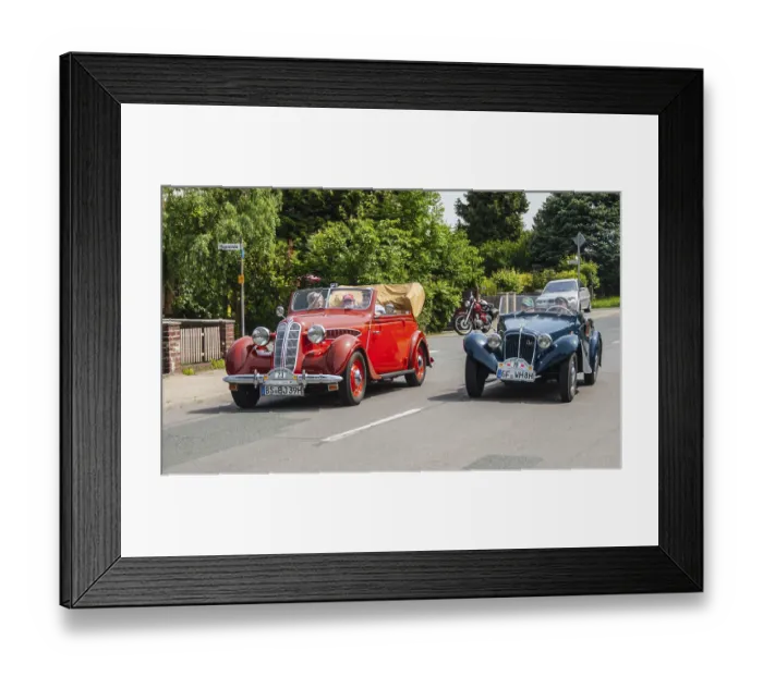 Framed Print : Two classic vintage cars, a red and a blue car