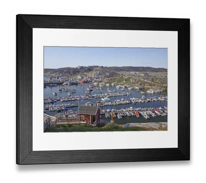 Framed Print : Leisure boats moored in the harbour