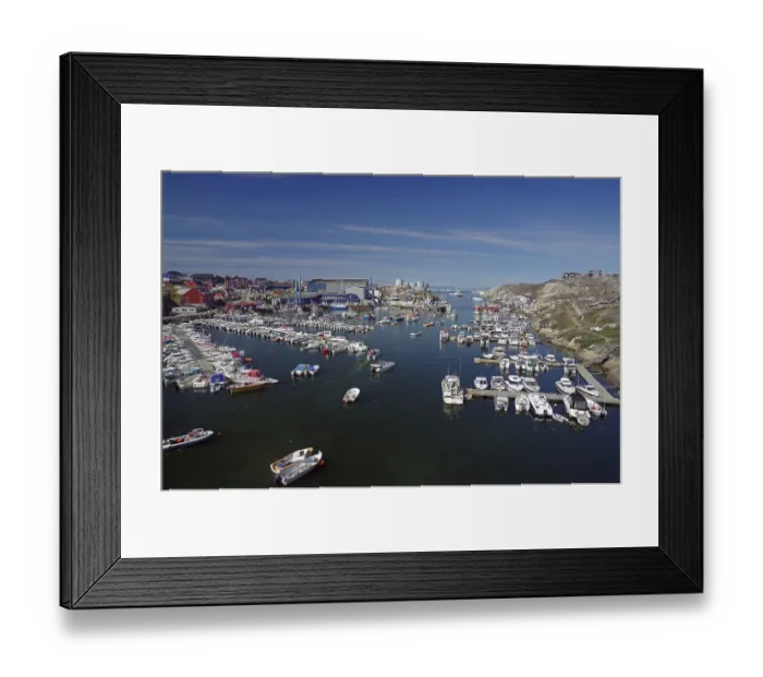 Framed Print : Leisure boats moored in the harbour