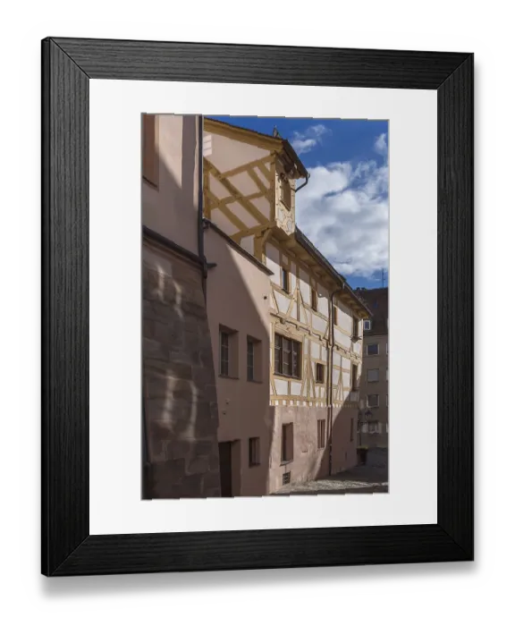 Framed Print : Historic half-timbered house in the old town