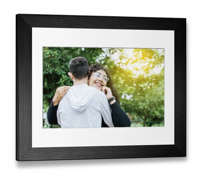 Framed Print : Teenage couple hugging outdoors Framed Print : Teenage couple hugging outdoors