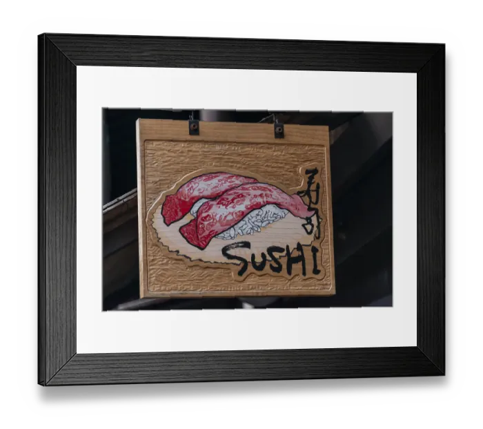 Framed Print : Signboard with inscription Sushi in front of a restaurant Framed Print : Signboard with inscription Sushi in front of a restaurant