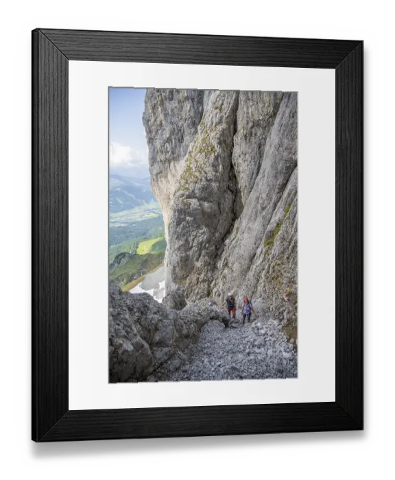 Framed Print : Two mountaineers with helmets climbing on a rock face Framed Print : Two mountaineers with helmets climbing on a rock face