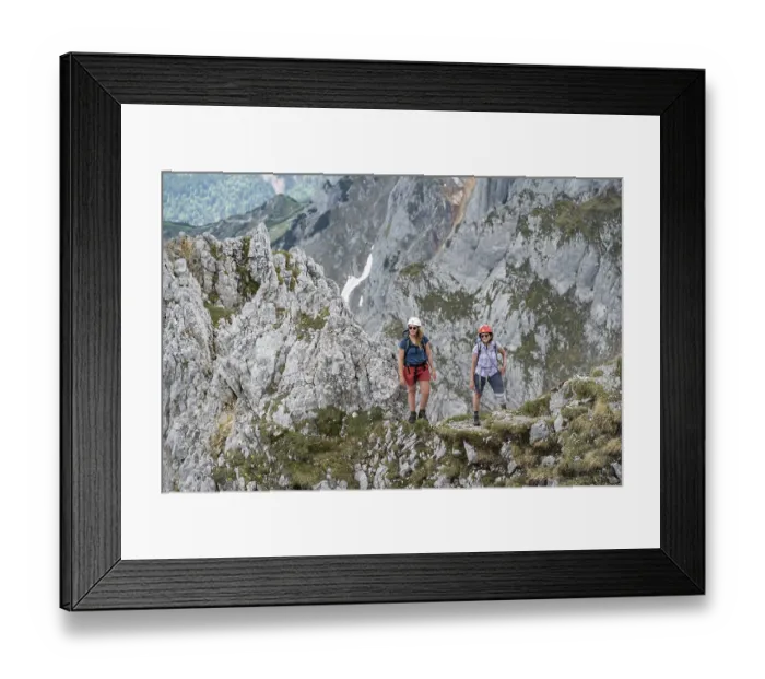 Framed Print : Mountaineer with helmet, ascent to the Ackerlspitze