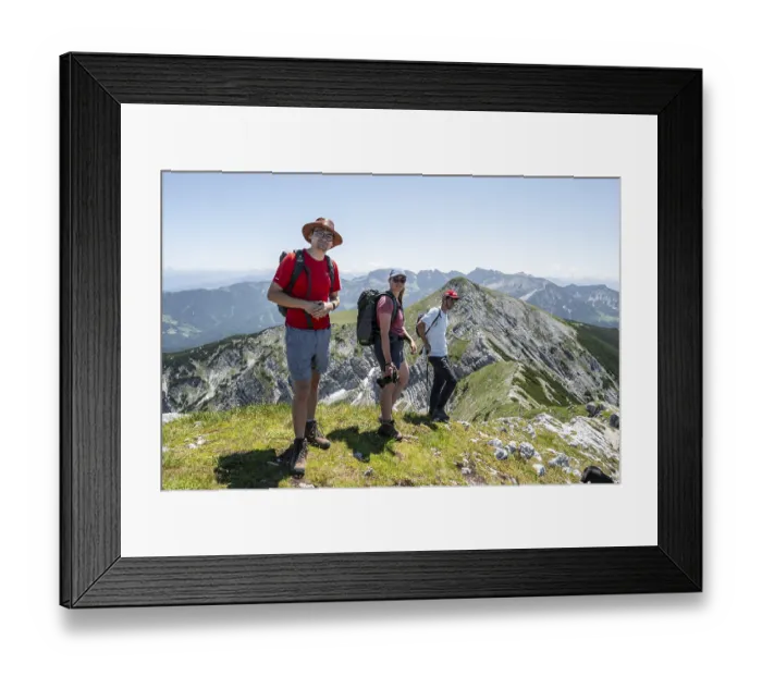 Framed Print : Mountaineer on the summit ridge of the Unnuetz