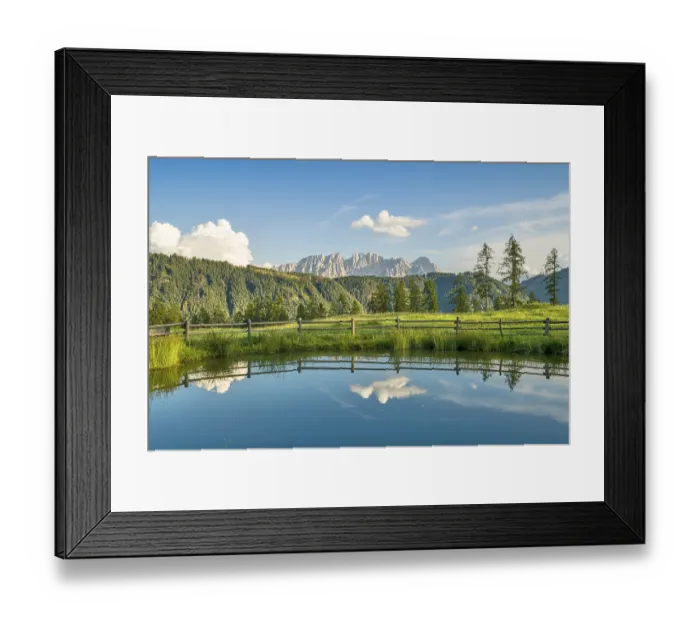 Framed Print : Mountains reflected in a small mountain lake