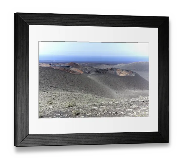 Framed Print : Volcanic landscape with visitor centre in Timanfaya National Park