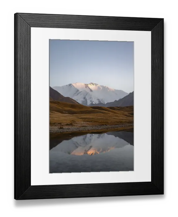 Framed Print : White glaciated and snowy mountain peak Pik Lenin at sunset Framed Print : White glaciated and snowy mountain peak Pik Lenin at sunset