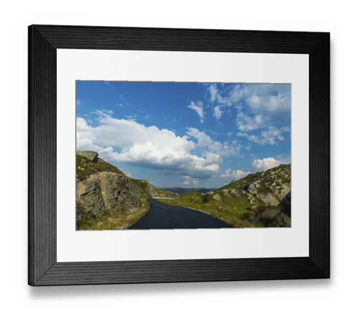 Framed Print : Road leading through the mountain scenery above Lystrefjord