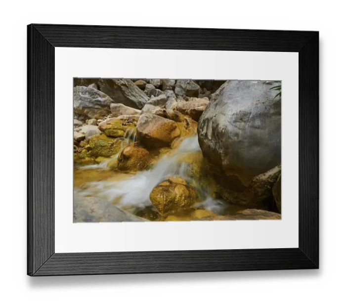 Framed Print : Small waterfall, rocks, long exposure