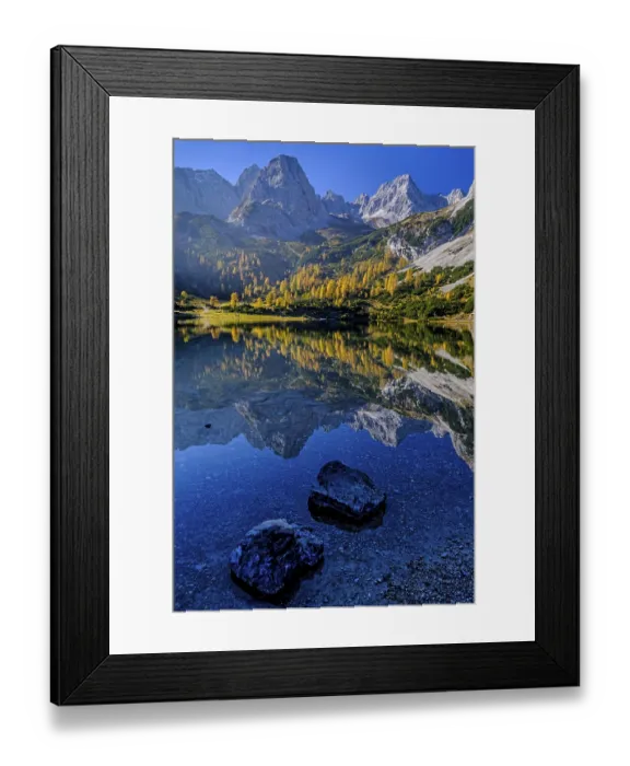 Framed Print : Reflection of steep mountains in a mountain lake