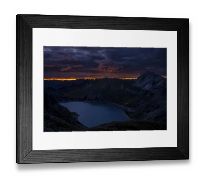 Framed Print : Lake Luener See with Montafon mountains and dramatic cloudy sky at sunrise Framed Print : Lake Luener See with Montafon mountains and dramatic cloudy sky at sunrise