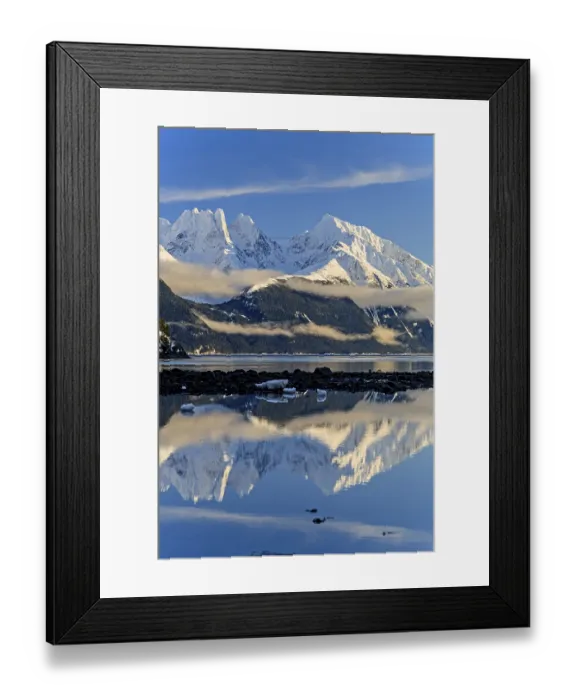 Framed Print : Snowy mountains reflected in fjord
