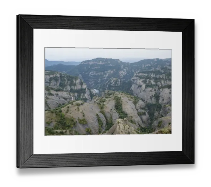 Framed Print : Mountain range of the Spanish Pyrenees on a cloudy day