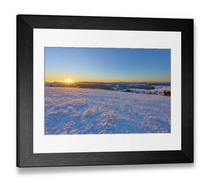 Framed Print : Snow-covered landscape at sunrise lying gently over the hills Framed Print : Snow-covered landscape at sunrise lying gently over the hills