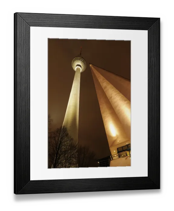 Framed Print : TV Tower illuminated in the evening