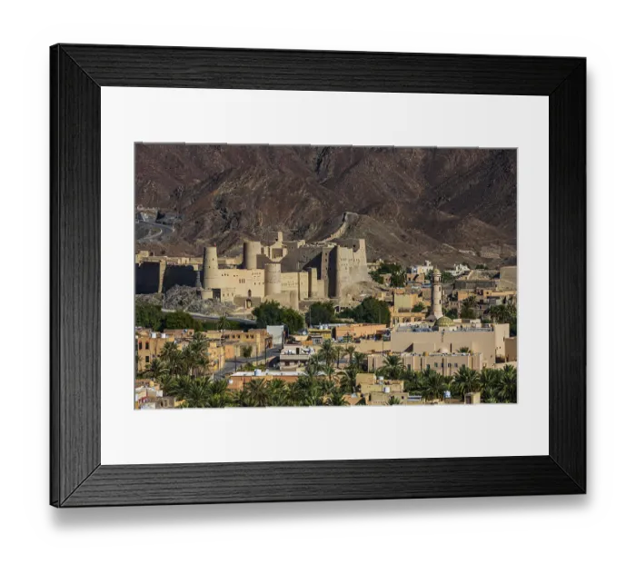 Framed Print : View of the town of Bahla, with the clay fortress of Hisn Tamah in the background Framed Print : View of the town of Bahla, with the clay fortress of Hisn Tamah in the background