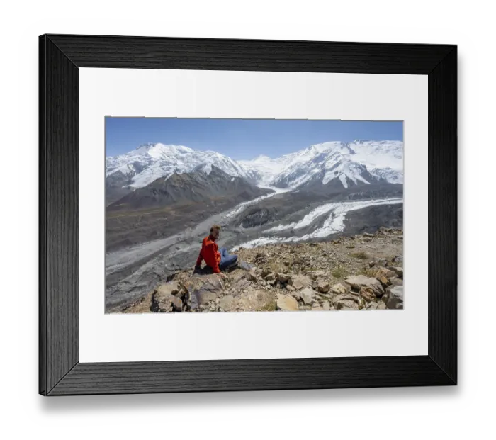 Framed Print : Mountaineer at Traveller's Pass with view of impressive mountain landscape