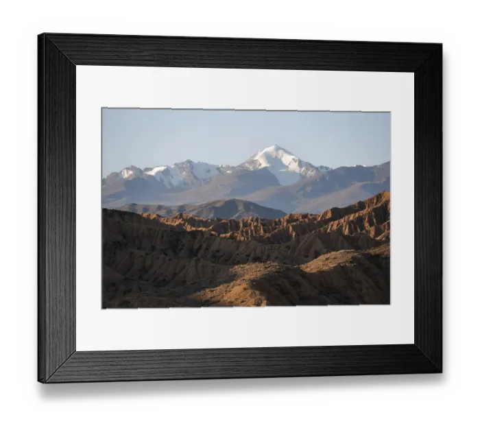 Framed Print : Sunrise over canyons, Tian Shan mountains in the background