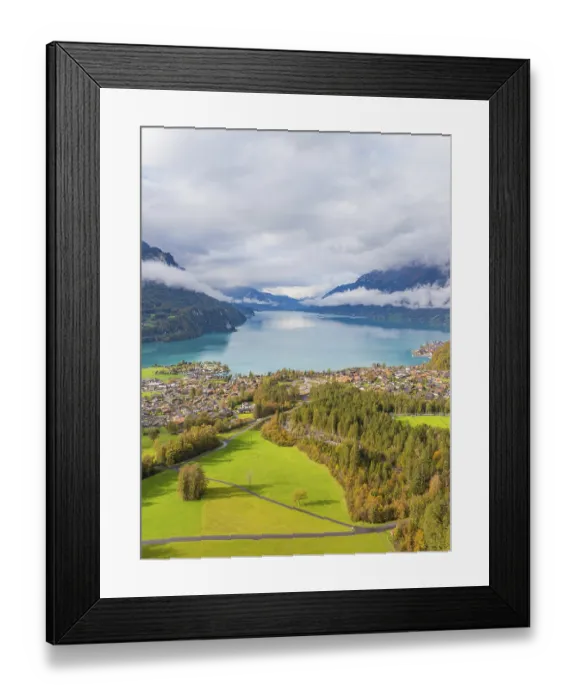 Framed Print : Painted village landscape with a lake and mountains in the background Framed Print : Painted village landscape with a lake and mountains in the background