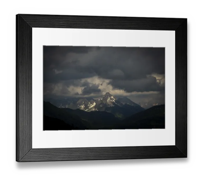 Framed Print : Summit of the Biberkopf with remnants of snow and dramatic clouds Framed Print : Summit of the Biberkopf with remnants of snow and dramatic clouds