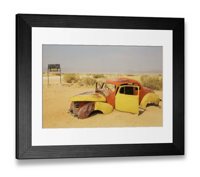 Framed Print : Abandoned vintage car at the hamlet of Solitaire between Sawakopmund and Sesriem at the edge of the Namib Desert