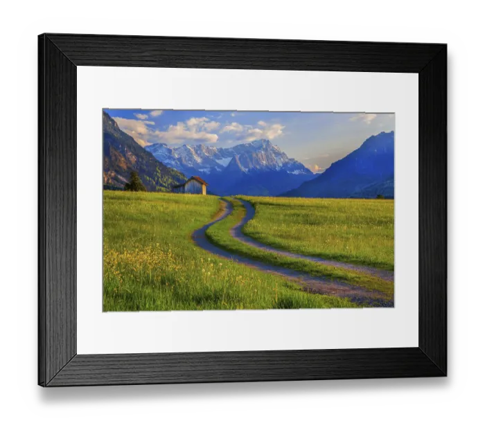 Framed Print : Spring meadow with the Zugspitzgruppe 2962m in the evening sun Framed Print : Spring meadow with the Zugspitzgruppe 2962m in the evening sun