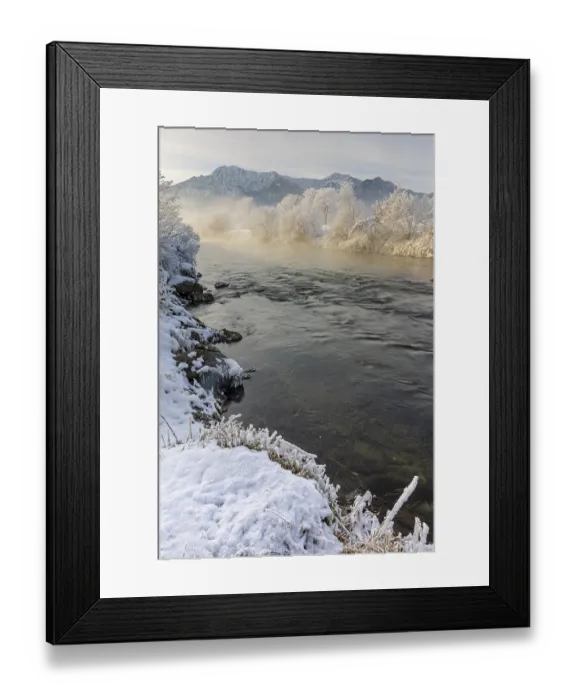Framed Print : River in the morning light in front of mountains